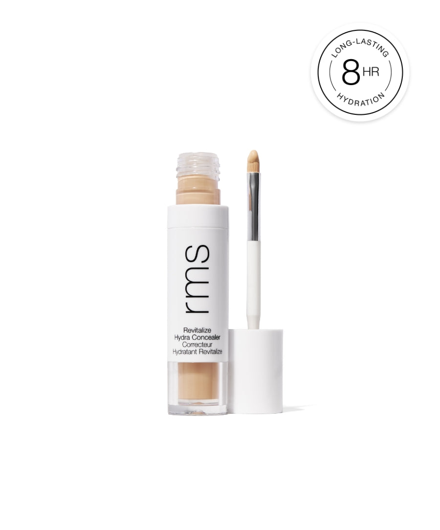 RMS Beauty Revitalize Hydra Concealer with applicator brush, featuring lightweight, hydrating formula for long-lasting coverage and 8-hour hydration benefit.
