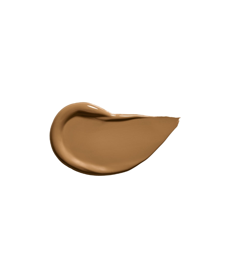 Swatch of warm medium tan shade of Revitalize Hydra Concealer with smooth creamy texture ideal for natural skincare infused makeup looks.