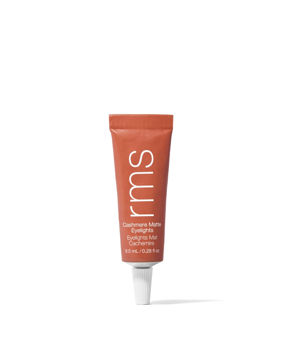 Tube of Cashmere Matte Eyelights in a warm clay shade with clean beauty formula, featuring natural and cruelty-free ingredients for subtle eye enhancement.