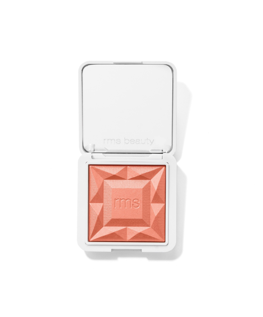Open compact featuring a coral shade of ReDimension Hydra Powder Blush with geometric embossed design, highlighting clean beauty and skincare infused makeup qualities.