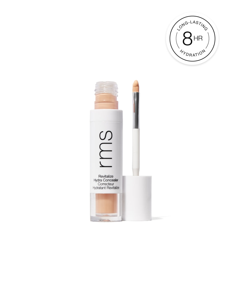 Revitalize Hydra Concealer by RMS Beauty in a sleek white tube with a brush applicator, featuring clean, natural ingredients and long-lasting hydration for up to 8 hours.