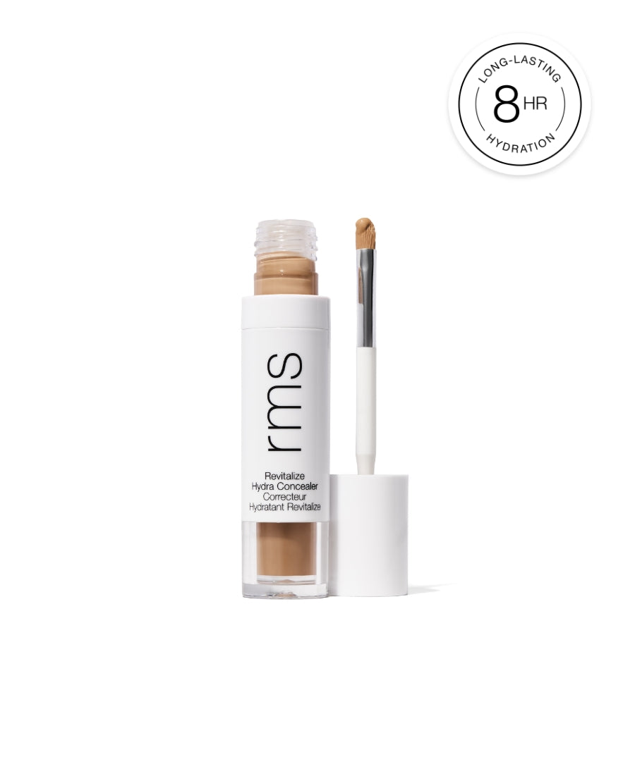 Revitalize Hydra Concealer with a lightweight formula in a sleek white tube, featuring a brush applicator and 8-hour long-lasting hydration for natural coverage.