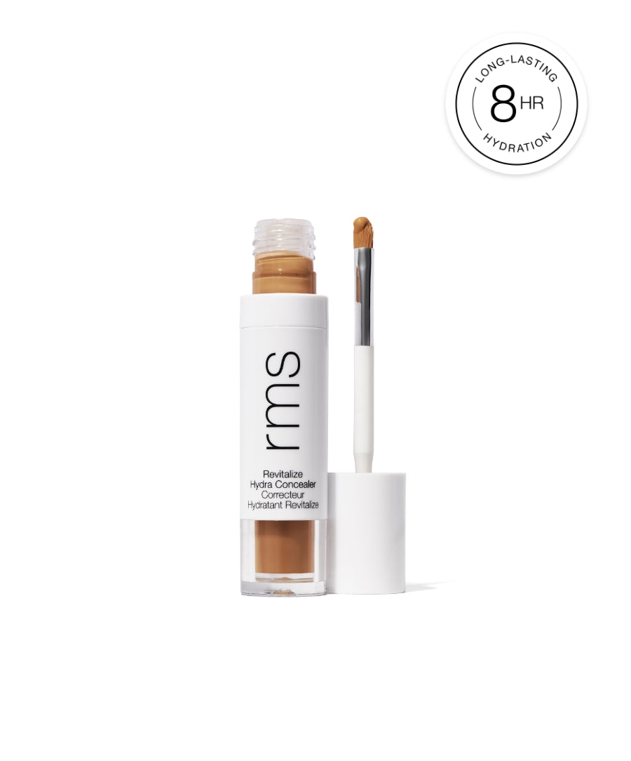 Revitalize Hydra Concealer with applicator wand, featuring long-lasting hydration for up to 8 hours, in sleek white and clear packaging with natural beige tone visible.