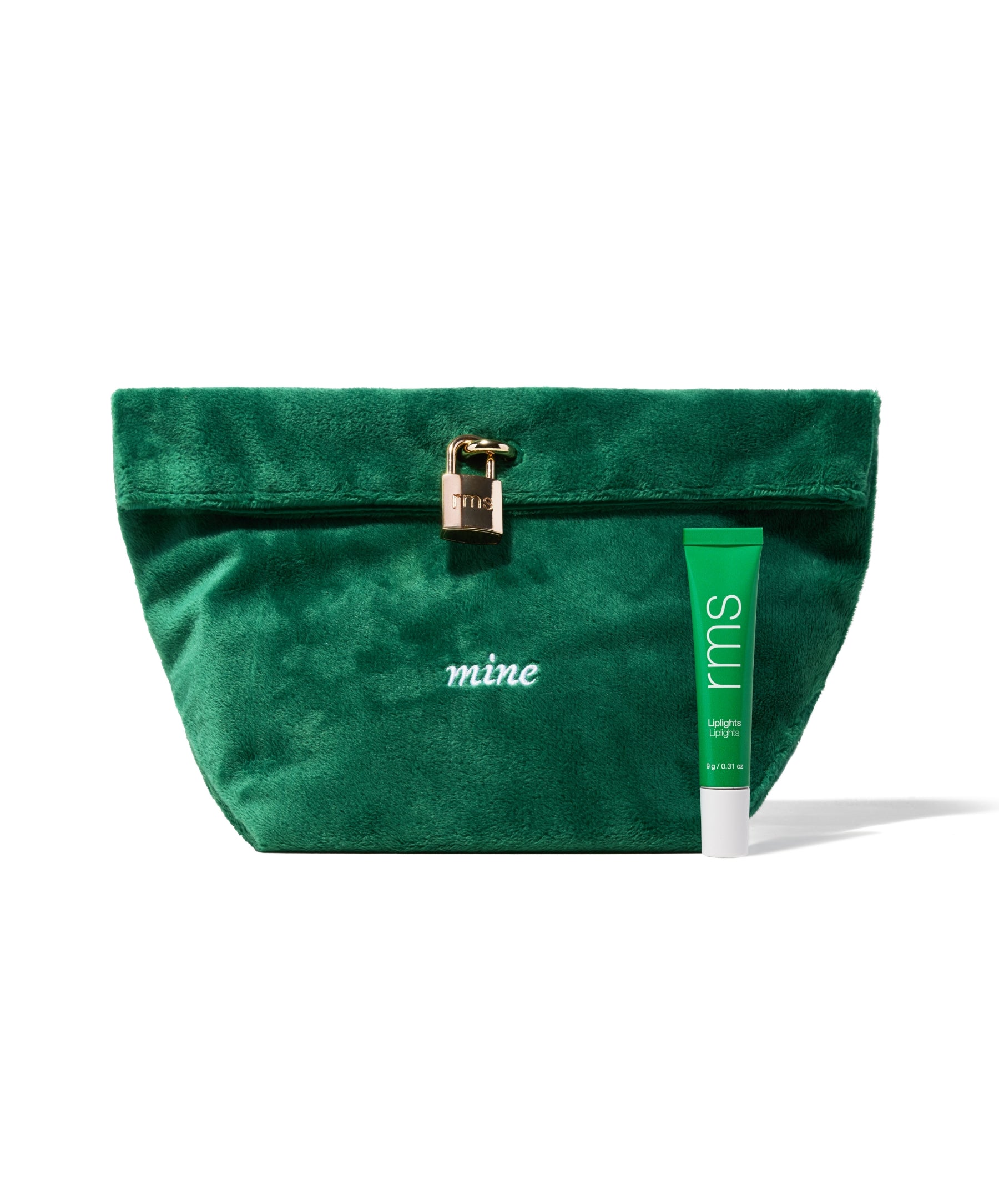 The Chameleon 2-Piece Set featuring a plush green velvet pouch with a gold-toned lock and an rms beauty green tube of clean, cruelty-free makeup with natural ingredients.