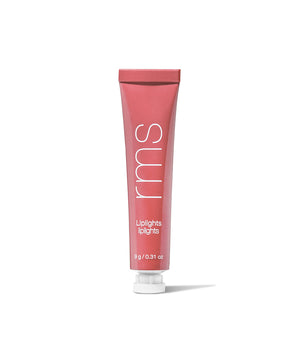 A pink tube of Liplights Cream Lip Gloss by RMS Beauty featuring clean, natural ingredients in recyclable packaging, designed as a sustainable, cruelty-free makeup option.