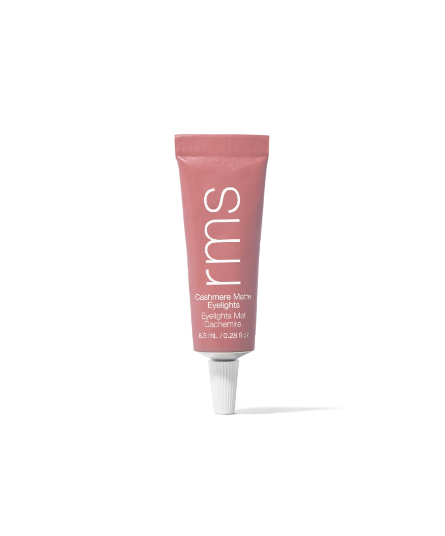 Tube of Cashmere Matte Eyelights makeup in muted pink shade, highlighting clean beauty and natural ingredients, cruelty-free skincare infused makeup in recyclable packaging.