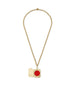 HART x RMS: Lip2Cheek Locket featuring a gold chain with an open locket holding a vibrant red lip and cheek color, combining clean beauty and elegant sustainable packaging.