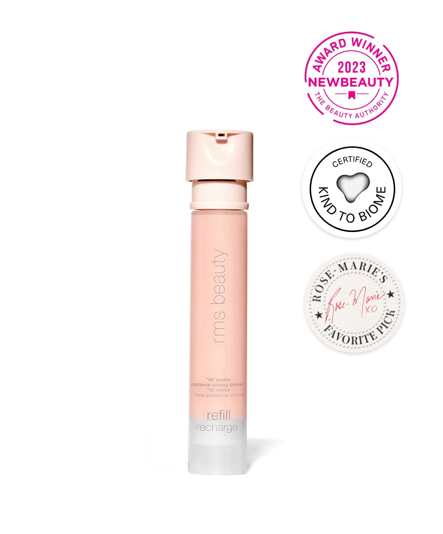 RMS Beauty ReEvolve Radiance Locking Primer refill pack standing upright with award badges for New Beauty 2023, Kind to Bionature certification, and Rose Marie's favorite pick.