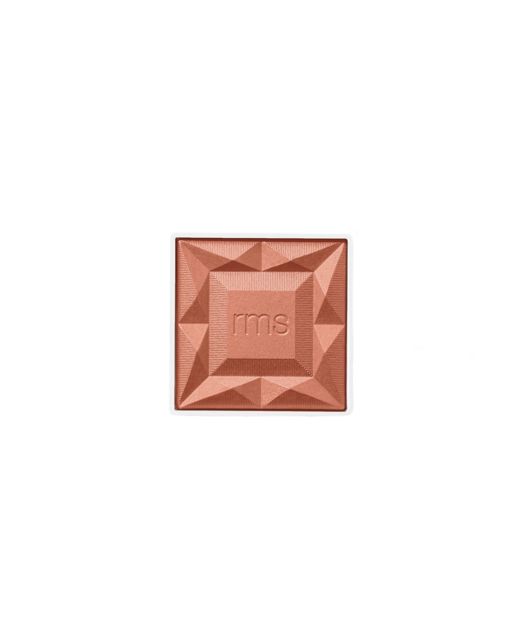 Close-up of a square ReDimension Hydra Powder Blush in a warm terracotta shade with a geometric embossed design and "rms" lettering, highlighting natural and clean beauty makeup.