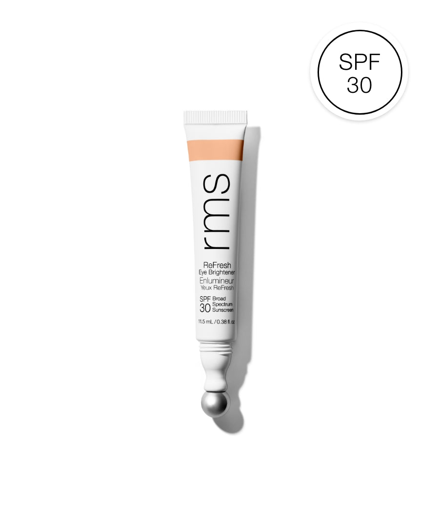ReFresh Eye Brightener Broad Spectrum SPF 30 + Correcting Tint by RMS Beauty in a white squeeze tube with a metallic applicator tip, featuring clean beauty and sustainable packaging.