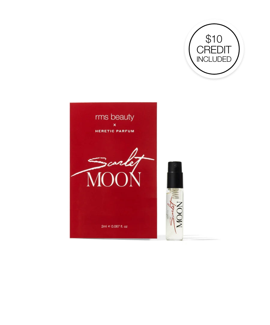 Sample vial of RMS x Heretic: Scarlet Moon Fragrance with a deep red card packaging, featuring clean beauty and sustainable design elements.