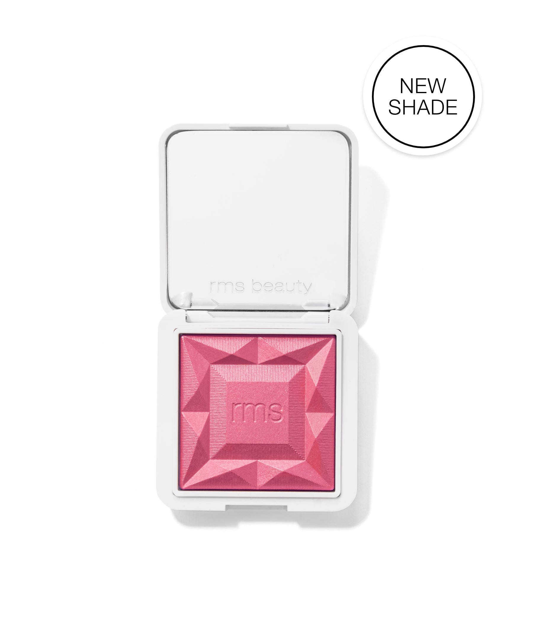 ReDimension Hydra Powder Blush in vibrant pink with geometric embossed design, presented in a white compact case, highlighting clean beauty and sustainable packaging.