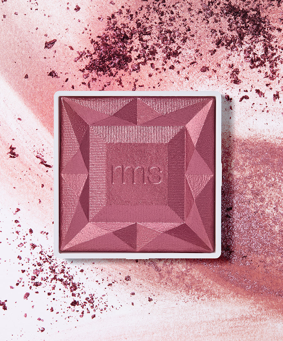 ReDimension Hydra Powder Blush in a deep pink shade with a faceted geometric design, featuring a soft powder texture and clean beauty ingredients.