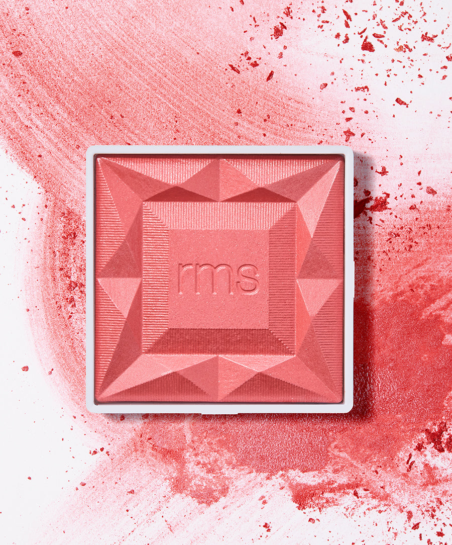 ReDimension Hydra Powder Blush in a warm pomegranate shade with a geometric embossed design, cruelty free makeup featuring clean and natural ingredients.